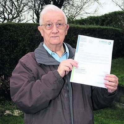 Trevor Harris with his letter from Denbighshire County Council (Credit: Rhyl Journal)